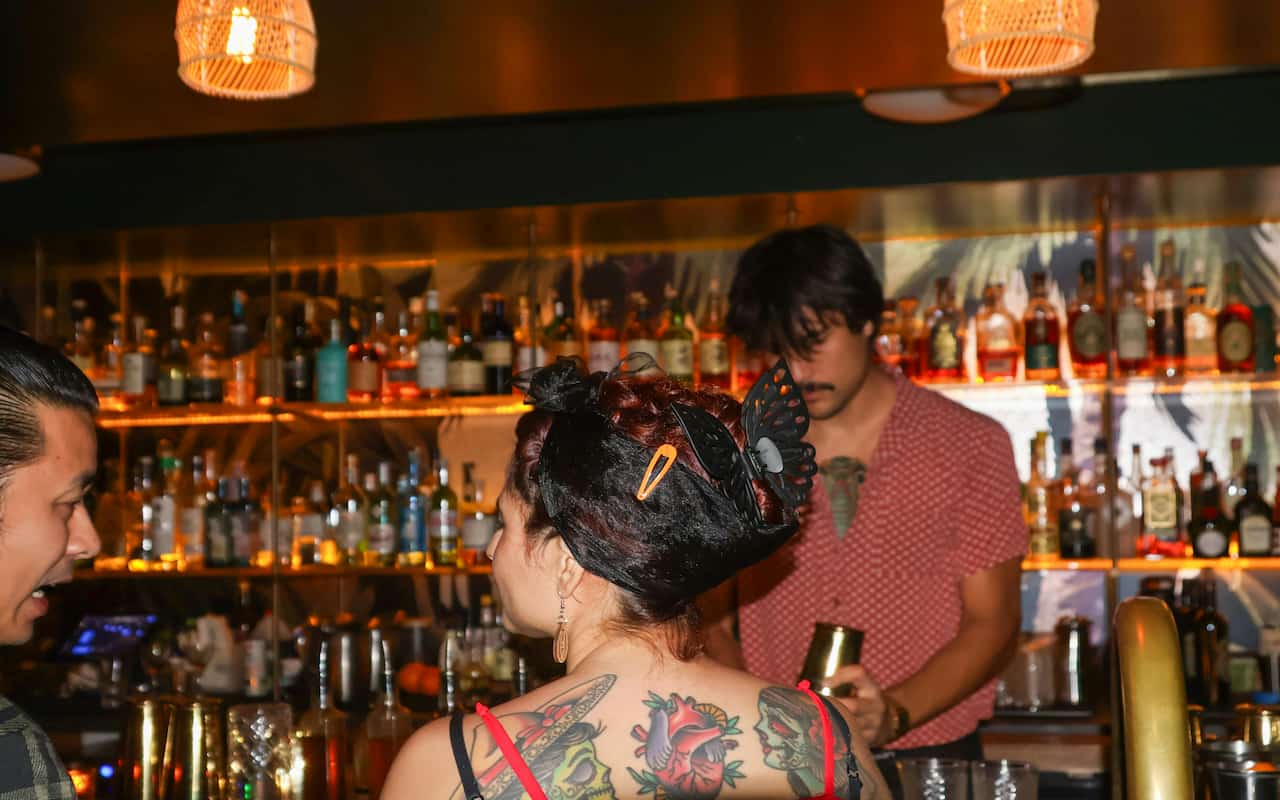 Couple at bar Photo by Meg von Haartman on Unsplash